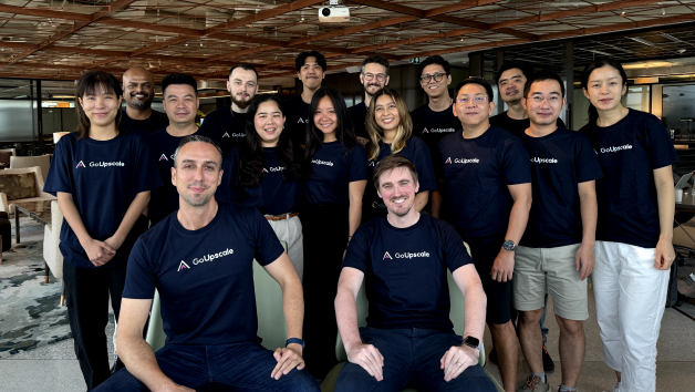 Photo of the GoUpscale team members at the office in Bangkok